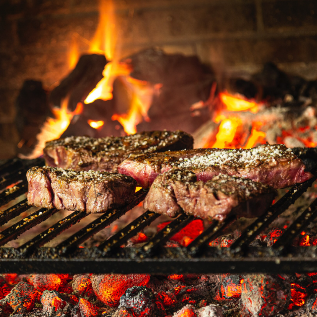 Steaks on open fire